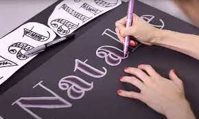 What to use to write on black poster board 