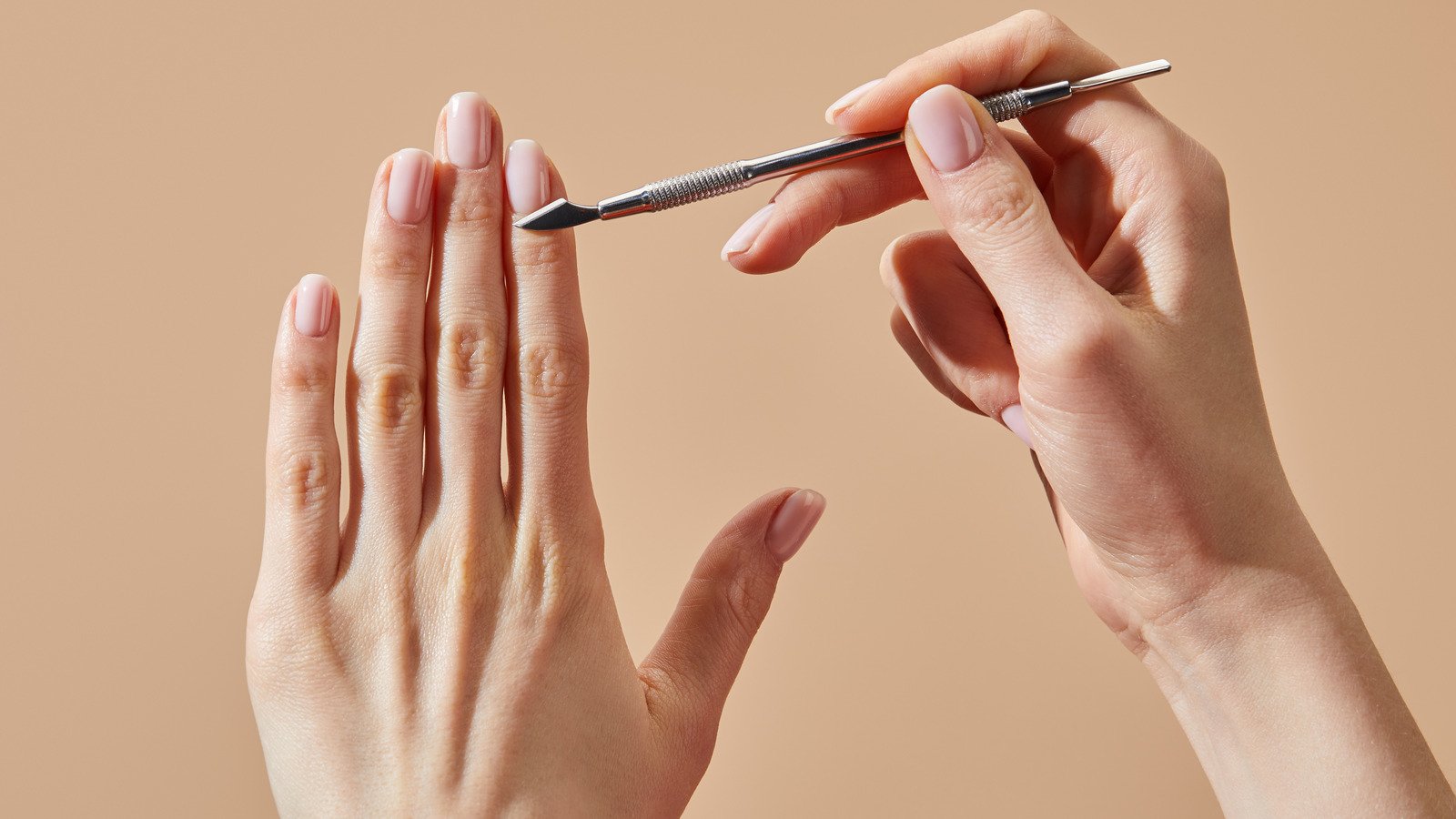 A image of metal cuticle pusher