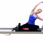 Are you considering adding Pilates to your home workout routine? Choosing the right equipment can make a significant difference in your exercise experience. The right tools enhance your performance and ensure that you get the most out of each session. You can elevate your workouts and achieve your fitness goals more effectively with the proper gear. With various options available, selecting the best Pilates machine might seem overwhelming. In this guide, we will help you make an informed decision that suits your needs. Understand Your Fitness Goals Before purchasing a machine, it's essential to understand your fitness goals. Are you looking to improve flexibility, strengthen your core, or recover from an injury? Knowing what you want to achieve will guide you in choosing the right equipment. For instance, if you're focused on rehabilitation, you might want a machine with gentle resistance. On the other hand, if you're looking to improve strength and conditioning, equipment with adjustable resistance will be more suitable. Consider the Space Available One key factor to consider when choosing Pilates equipment is the space available in your home. They can vary in size, and some may require more room than others. Measure the space where you place the machine to ensure it fits comfortably. Some models are foldable and can be stored away efficiently, making them perfect for smaller spaces. A larger, more permanent setup might be ideal if you have a dedicated workout room. Types of Machines There are different types of machines, and understanding the differences can help you choose the best one for your needs. The most common type is the reformer. This offers a full-body workout with adjustable resistance. The Cadillac machine, also known as a trapeze table, is more advanced and provides a wider range of exercises. Chair-based equipment and smaller, portable equipment like Pilates rings and bands are also available. Each type offers unique benefits, so consider what suits your fitness level and goals. Budget Considerations These machines can be a significant investment, so it's essential to consider your budget. Prices can range from a few hundred to several thousand dollars, depending on the brand and features. While opting for a cheaper model might be tempting, remember that quality and durability are crucial. High-quality equipment may save you money in the long run, as it will likely last longer and offer better performance. Ease of Assembly and Maintenance Another important factor to consider is the ease of assembly and maintenance. Some machines come pre-assembled, while others require you to put them together. If you're not handy, choose a machine that requires minimal assembly. Additionally, think about the maintenance requirements. Customer Reviews and Recommendations Before making your final decision, take the time to read customer reviews and seek recommendations. Reviews can provide valuable insights into the machine's performance, durability, and ease of use. Look for feedback from users with similar fitness goals and experience levels. Additionally, ask for recommendations from a Pilates instructor or friend with experience with home Pilates equipment. Warranty and Customer Support Pilates equipment is a significant purchase, so it's essential to consider the warranty and customer support. A solid warranty safeguards your investment and offers peace of mind. Be sure to review the warranty's coverage details and duration. It's also worth considering the manufacturer's reputation for customer service. Reliable customer support can be invaluable if you encounter any issues with your equipment. Choosing the right Pilates machine for your home doesn't have to be daunting. Pay attention to the features that matter most to you, and don't forget to check customer reviews and warranty details. With the right machine, you can enjoy effective workouts from the comfort of your home, enhancing your fitness journey every step of the way.